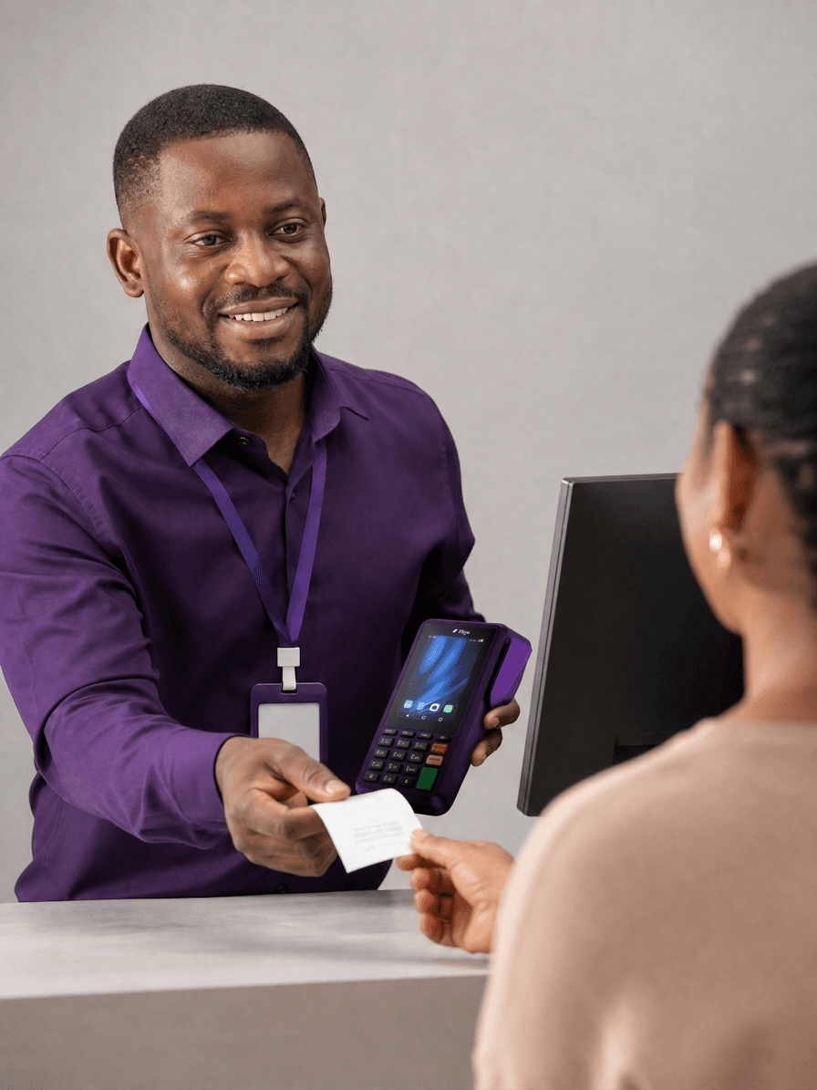A pharmacist handing a receipt to a customer after a Rigo POS payment